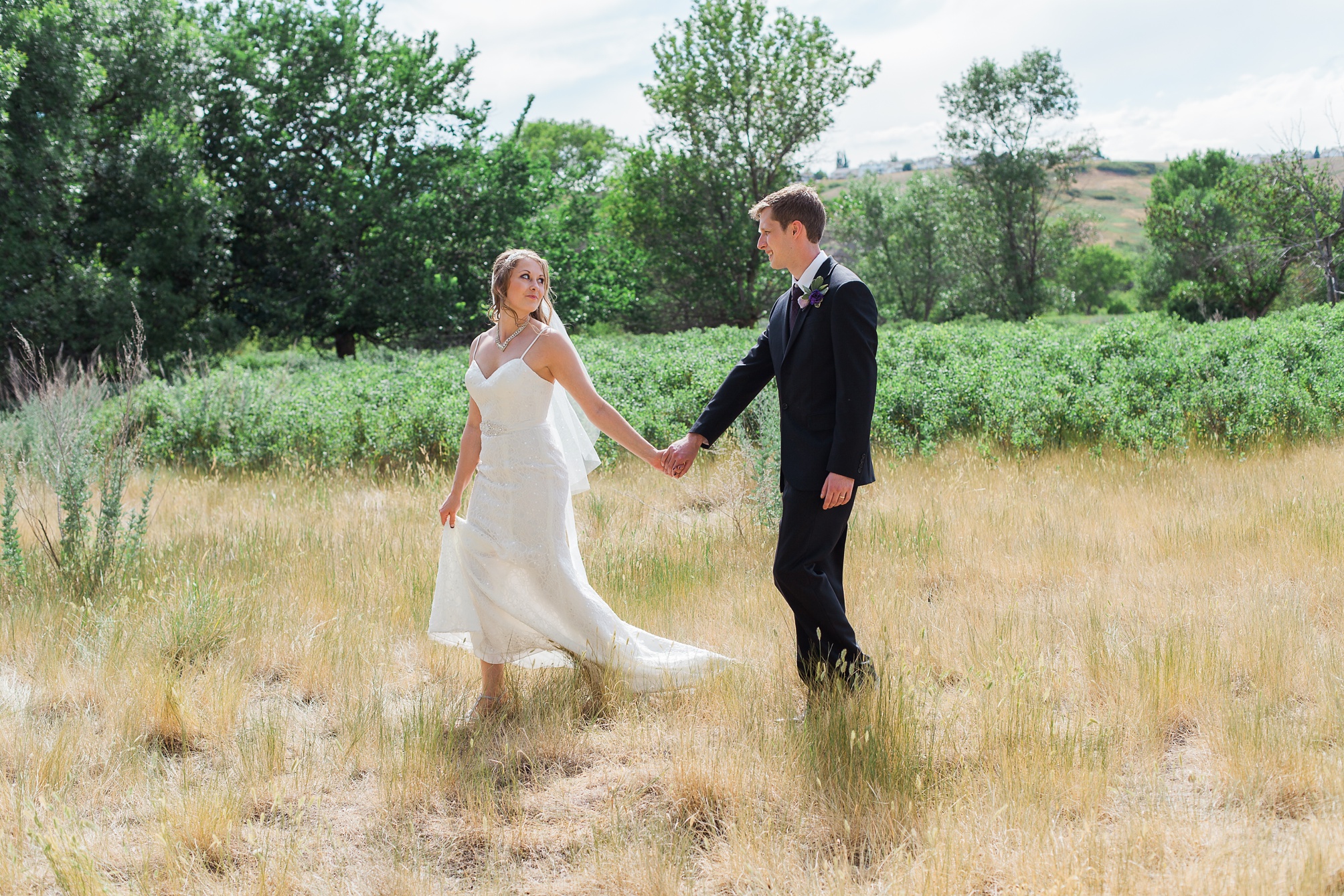 Lethbridge Bridal Portraits of this Purple and white Raymond Backyard Wedding by Kinsey Holt Photography