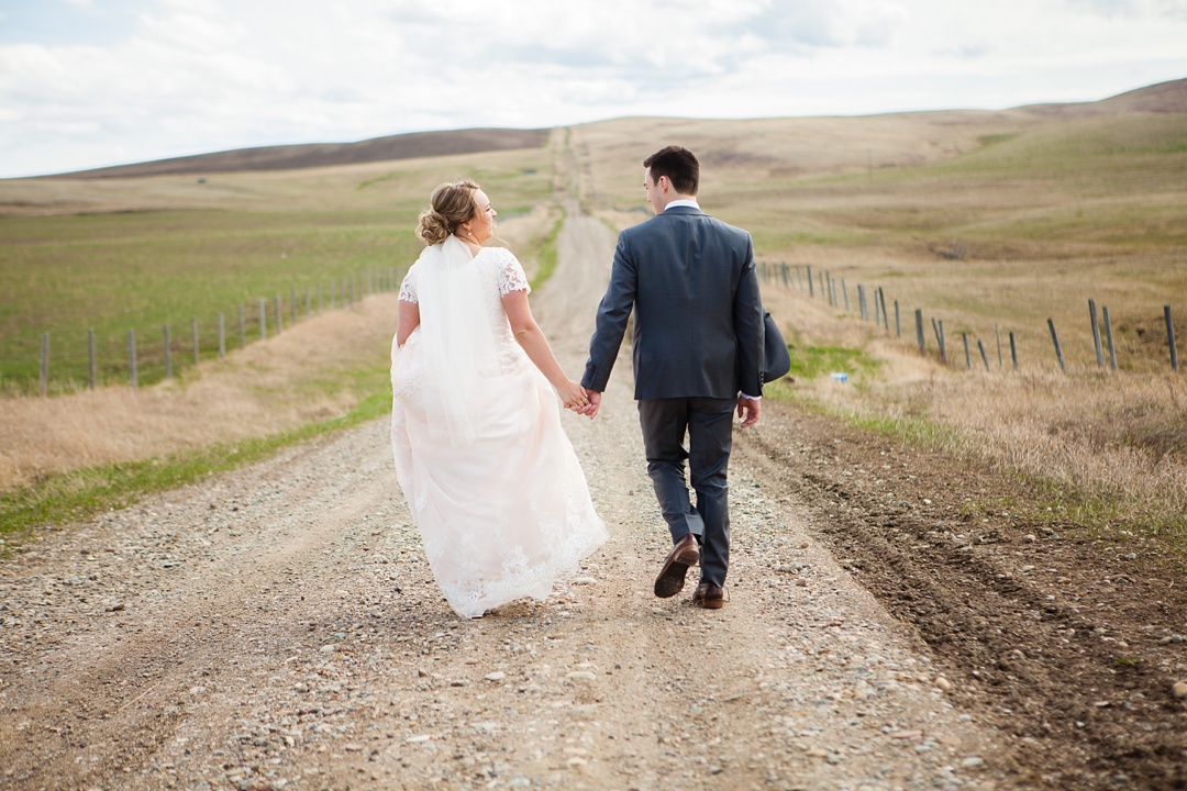 Blush pink lace wedding dress. Spring Cardston Temple wedding by Kinsey Holt Photography. Southern Alberta wedding photographer. 