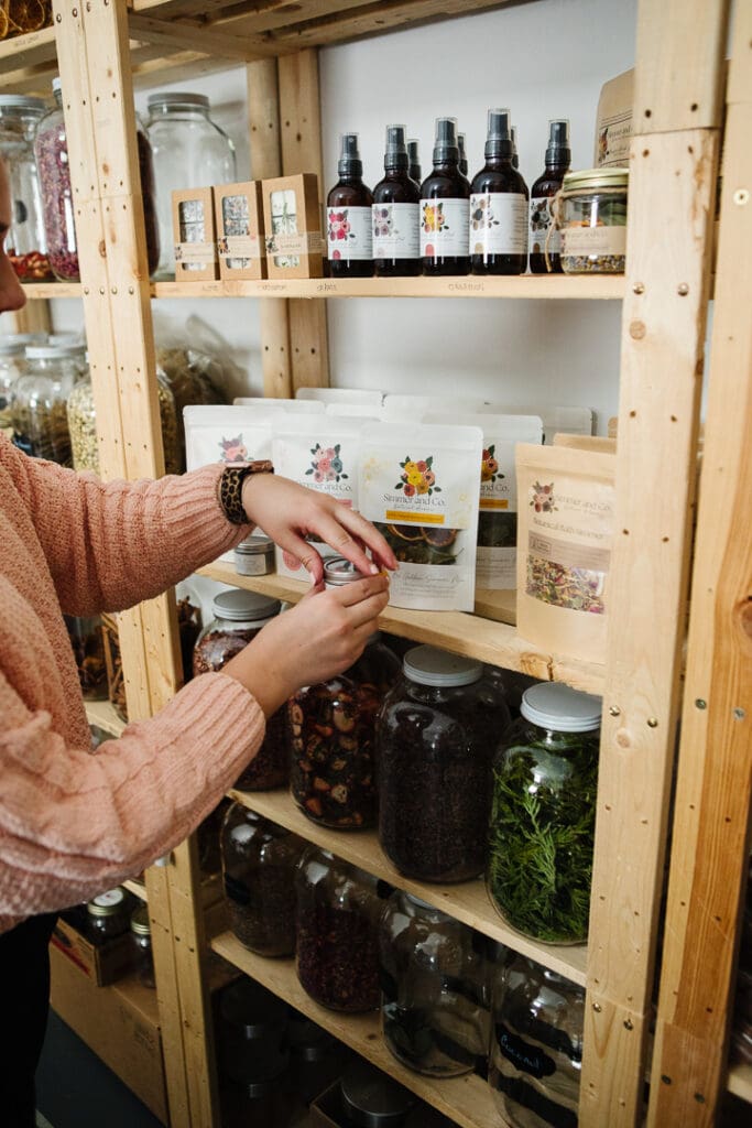 Simmer & Co Lethbridge small business product photos in-shop showing off her lineup of natural home fragrances