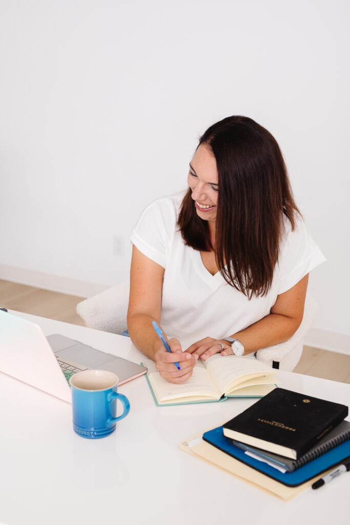 Vanessa Principalli from VMP Virtual working at a desk. Virtual Assistant Brand Photos Lethbridge Alberta